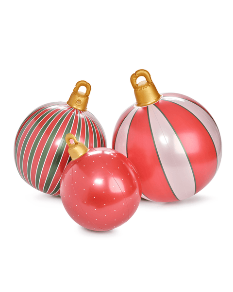 Three colorful inflatable Christmas ornaments with striped patterns on a white background