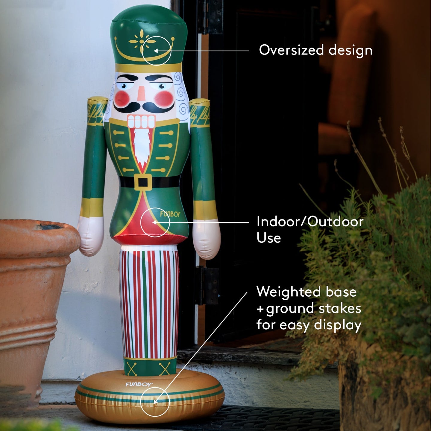 Decorative inflatable nutcracker with features highlighted, placed outdoors.