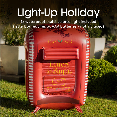 Inflatable letterbox with 'Letters to Santa' text, featuring a light-up feature on grass