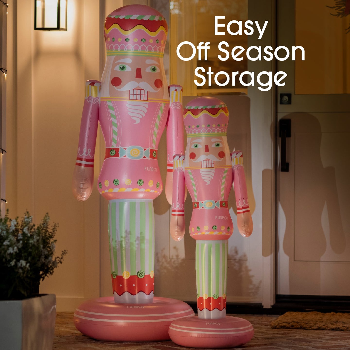 Two inflatable nutcrackers in front of a door with text 'Easy Off Season Storage'.