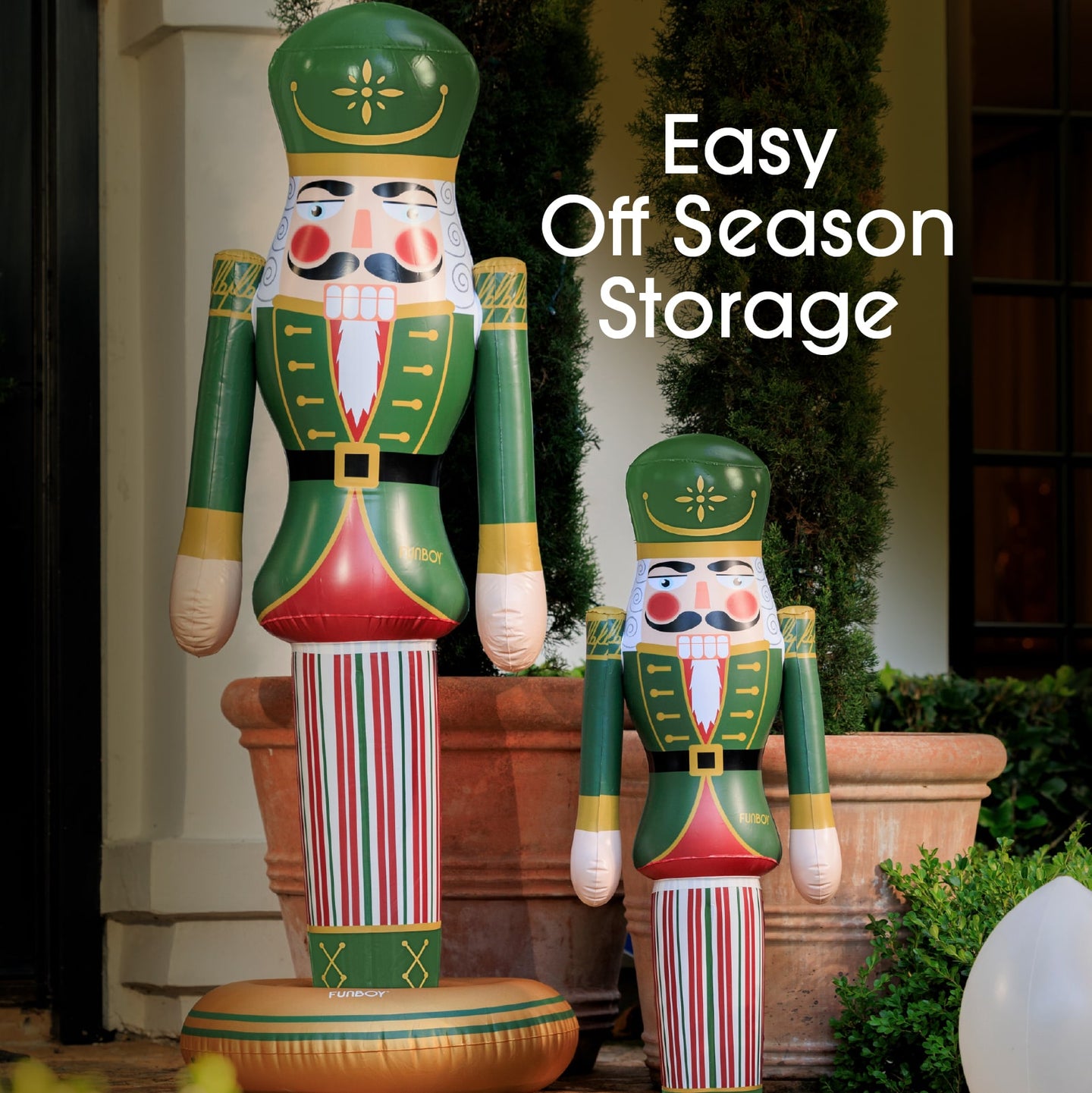 Two inflatable nutcrackers in front of a building with text 'Easy Off Season Storage'.