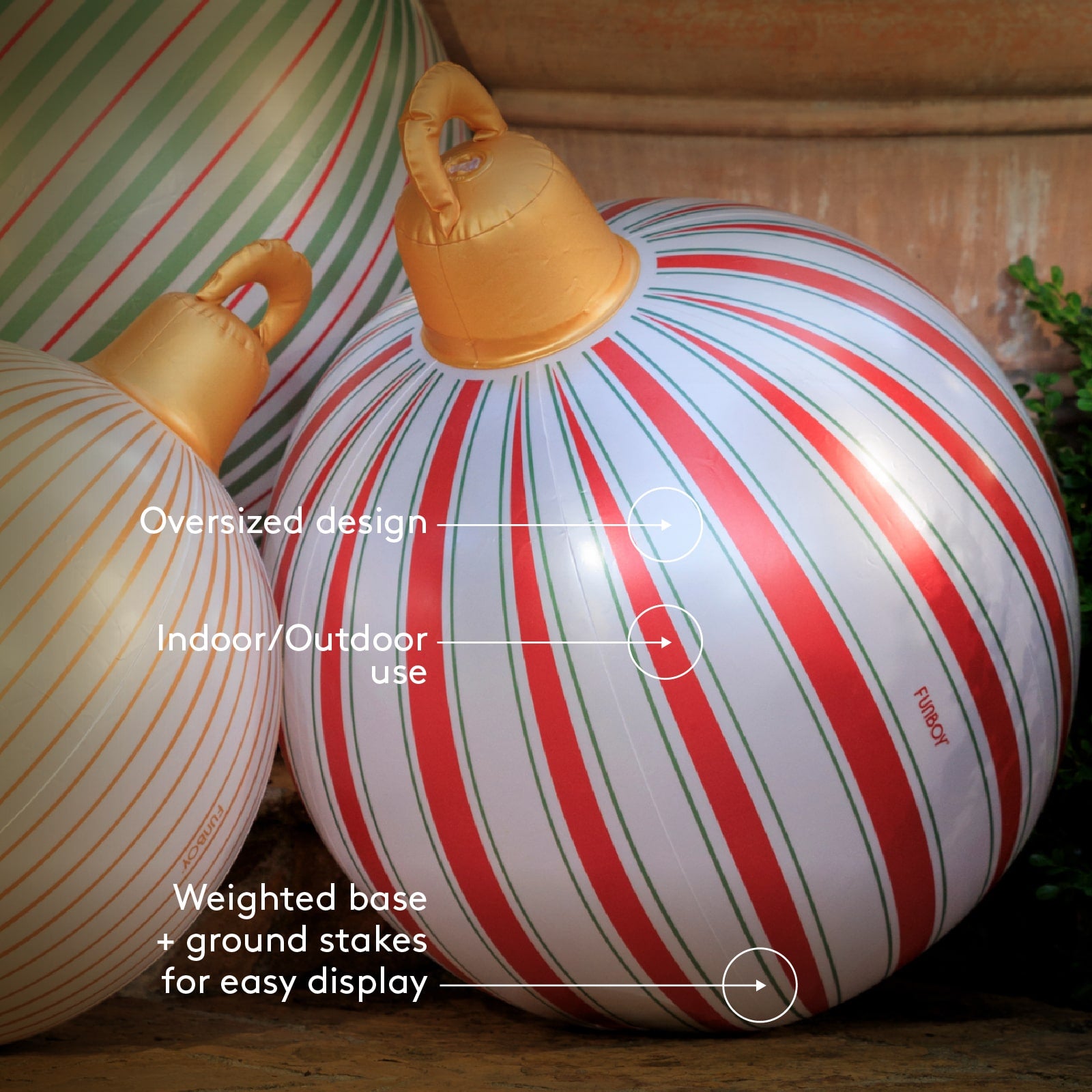 Decorative striped ball with text highlighting features on a striped background