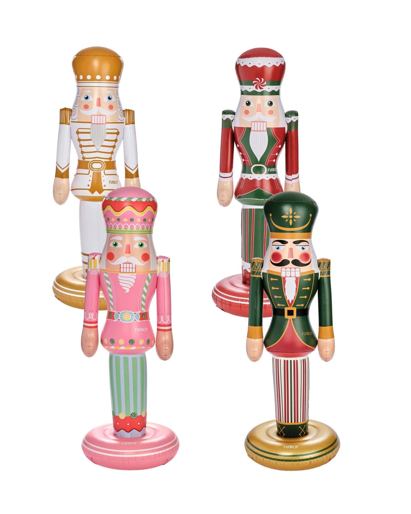 Four colorful nutcracker figurines on a white background