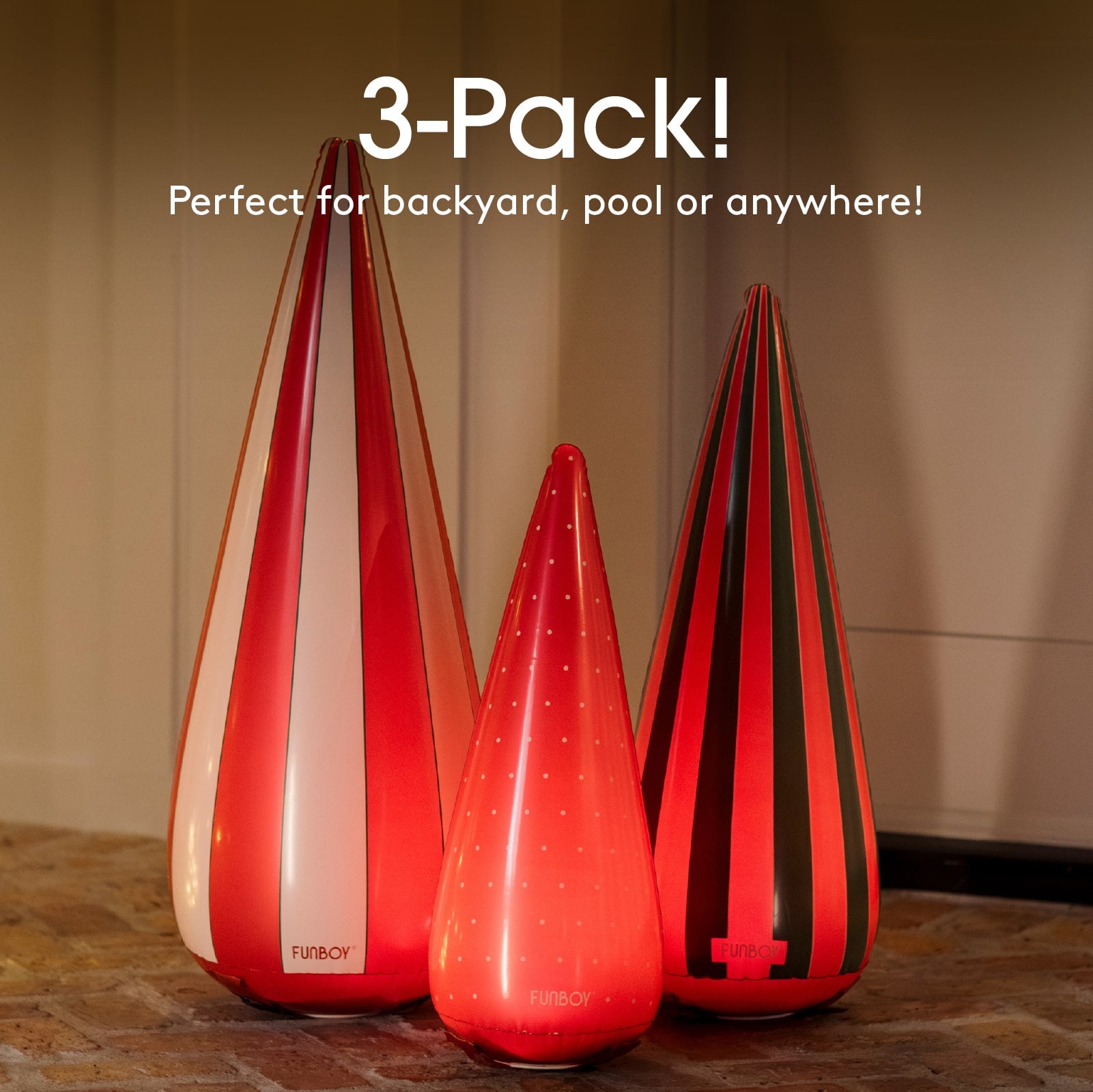 Three red and black striped inflatable pool toys on a wooden floor with text indicating a 3-pack.