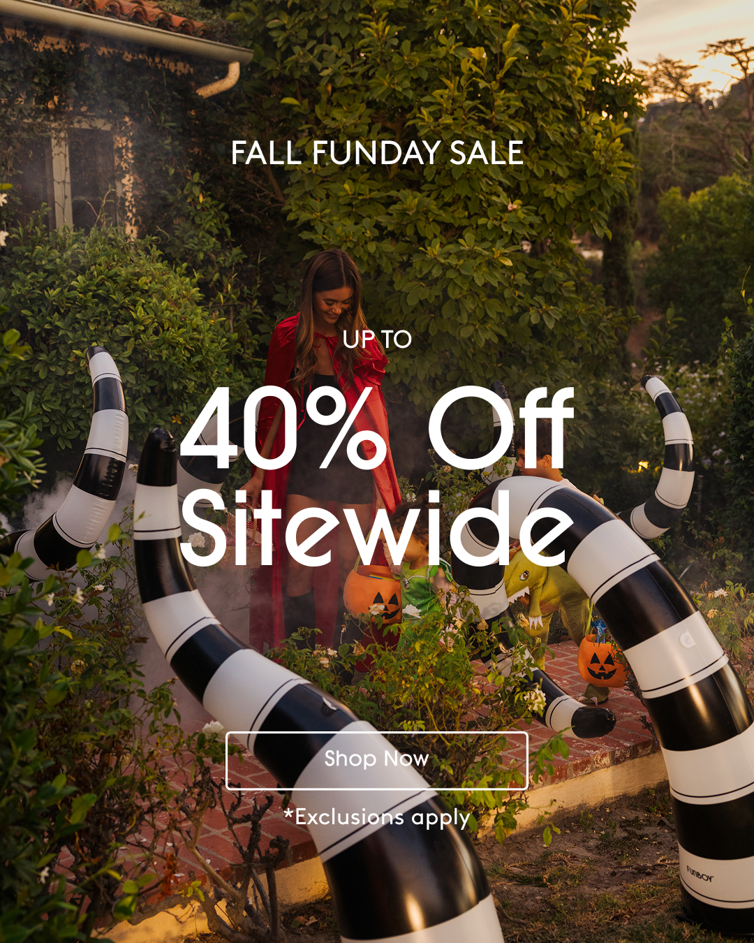 Halloween promotional banner with a woman in a red coat standing in a garden, surrounded by large black-and-white spider legs and pumpkins, with text reading 'FALL FUNDAY SALE' and 'UP TO 40% Off Sitewide'.