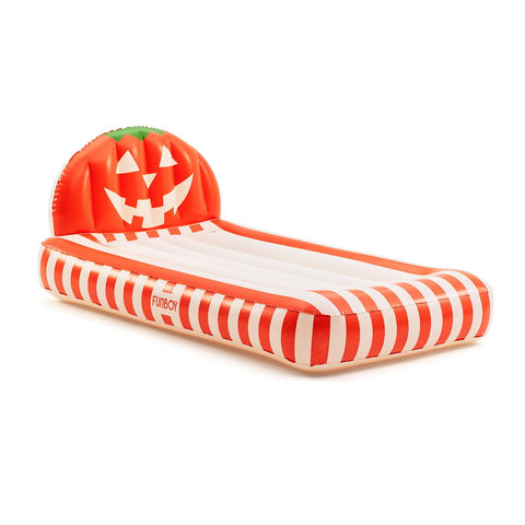 An inflatable pool float bed shaped like a jack-o'-lantern pumpkin, featuring a carved orange pumpkin headrest with a green stem and a white-and-orange striped body, shown on a plain white background.