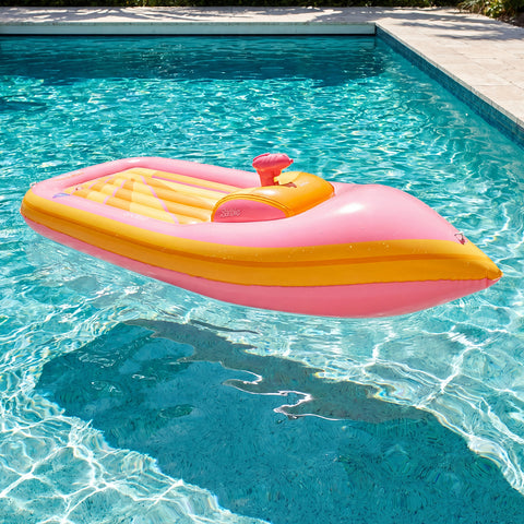 Inflatable pink and yellow Barbie boat pool float with water squirter