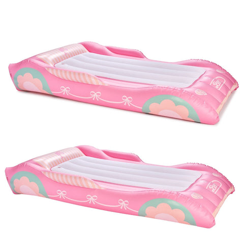 Two pink inflatable pool floats with bow designs on a white background