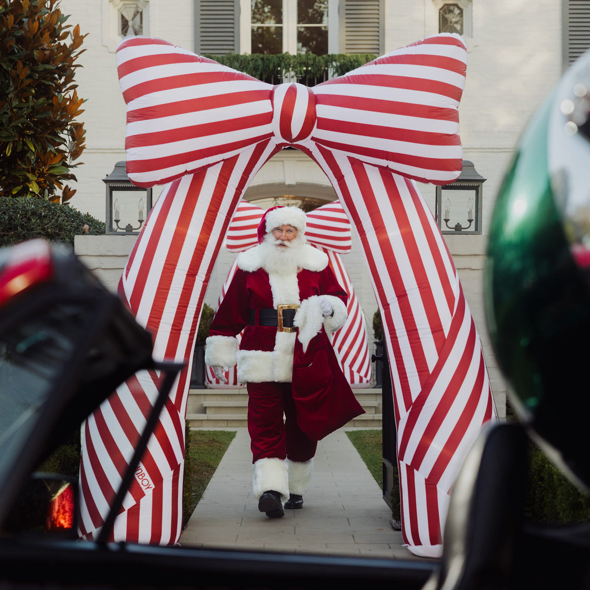 Santa with the FUNBOY Self-inflating Bow Arch