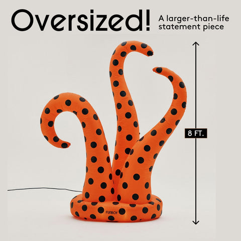 An oversized orange inflatable octopus-shaped statement piece with black polka dots, shown on a light gray background with text reading 'Oversized!' and a height marker of 8 ft.