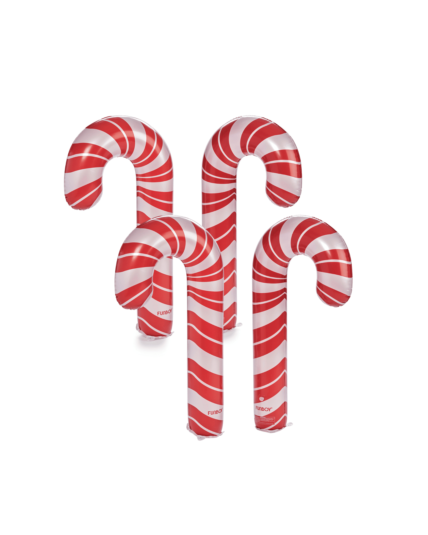 Four inflatable candy canes with red and white stripes on a white background