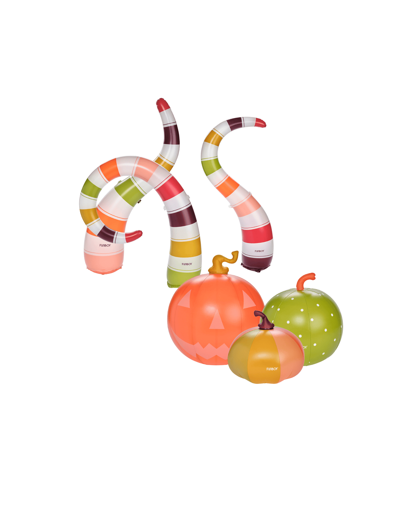 Colorful striped snake and pumpkin toys on a white background