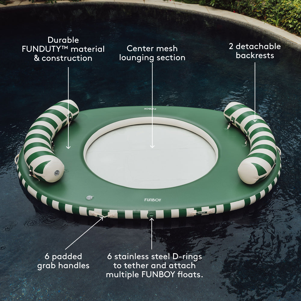 Green pool float with striped handles on water, featuring text labels about its features.