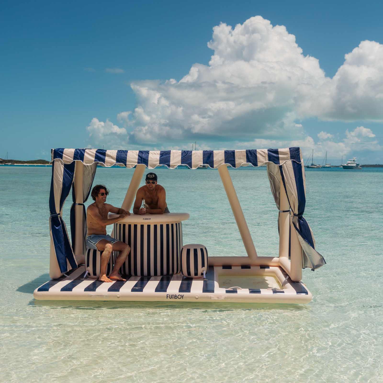 Giant VIP Cabana Island by FUNBOY floating in the water