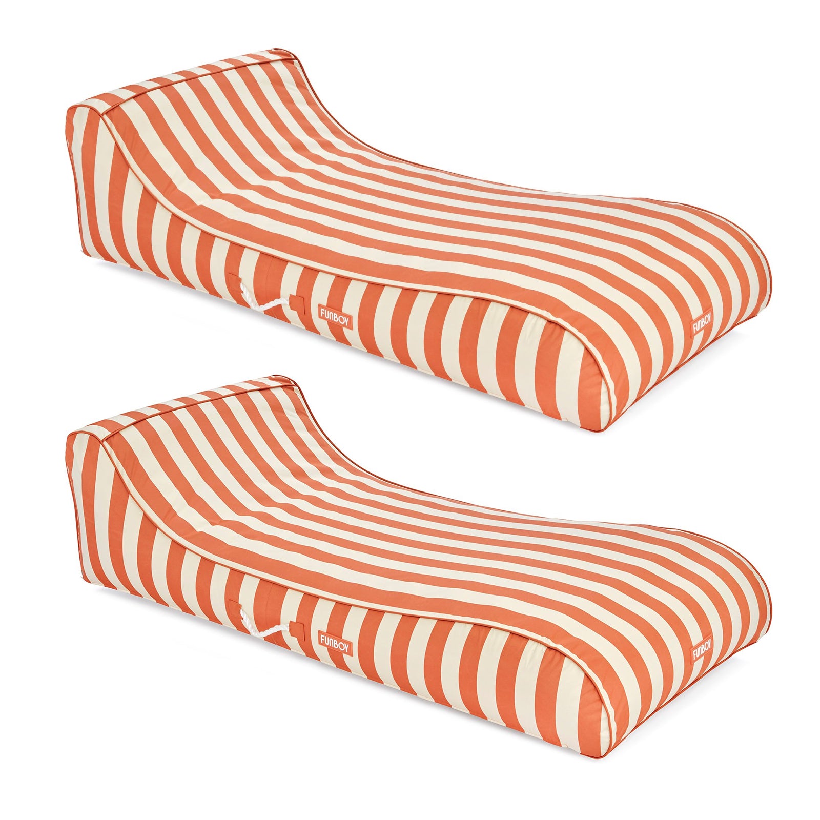 Two orange and white striped lounge cushions on a white background