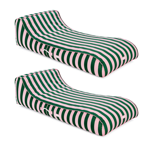 Two green and pink striped cushions on a white background