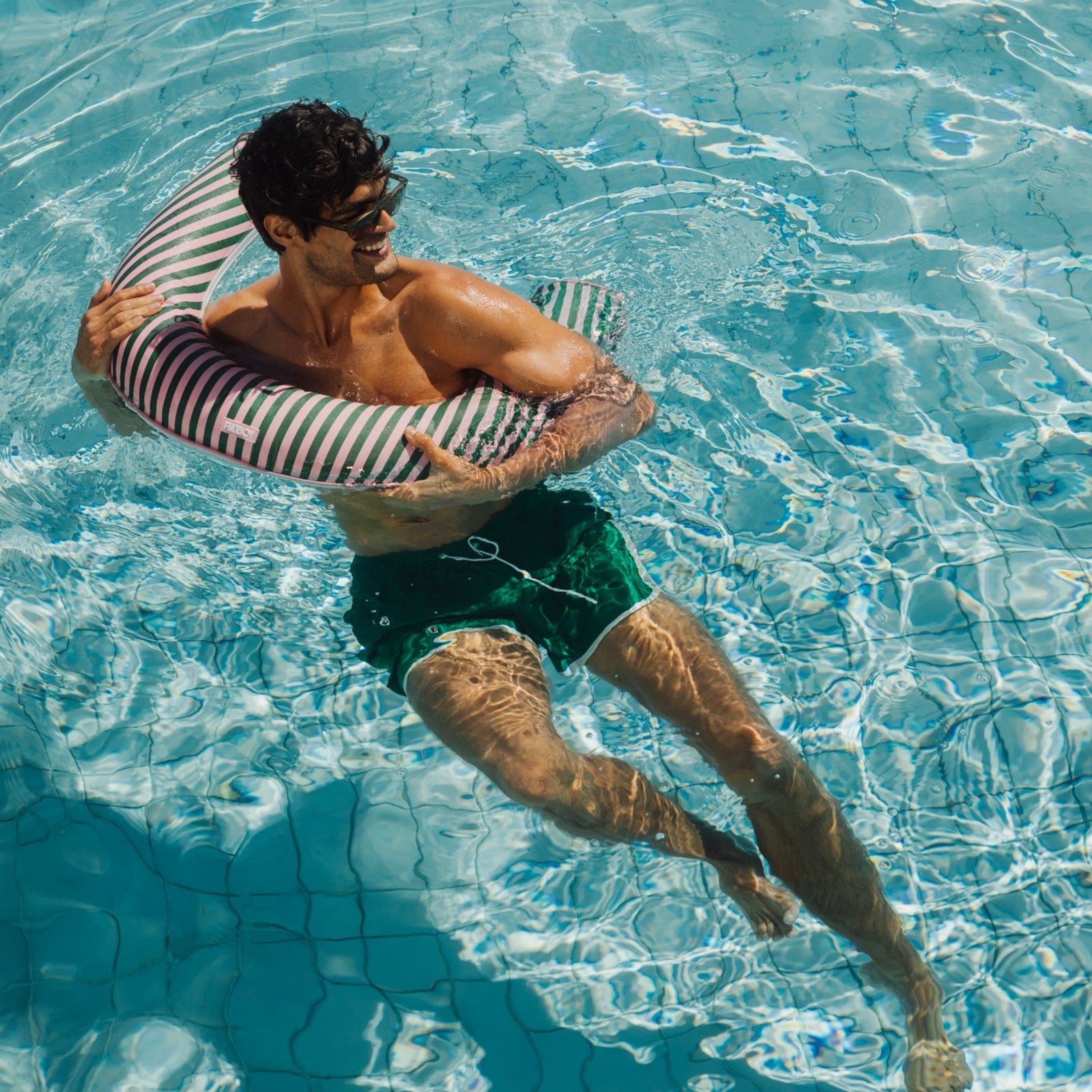 Striped  pink and green stripes on a fabric noodle float