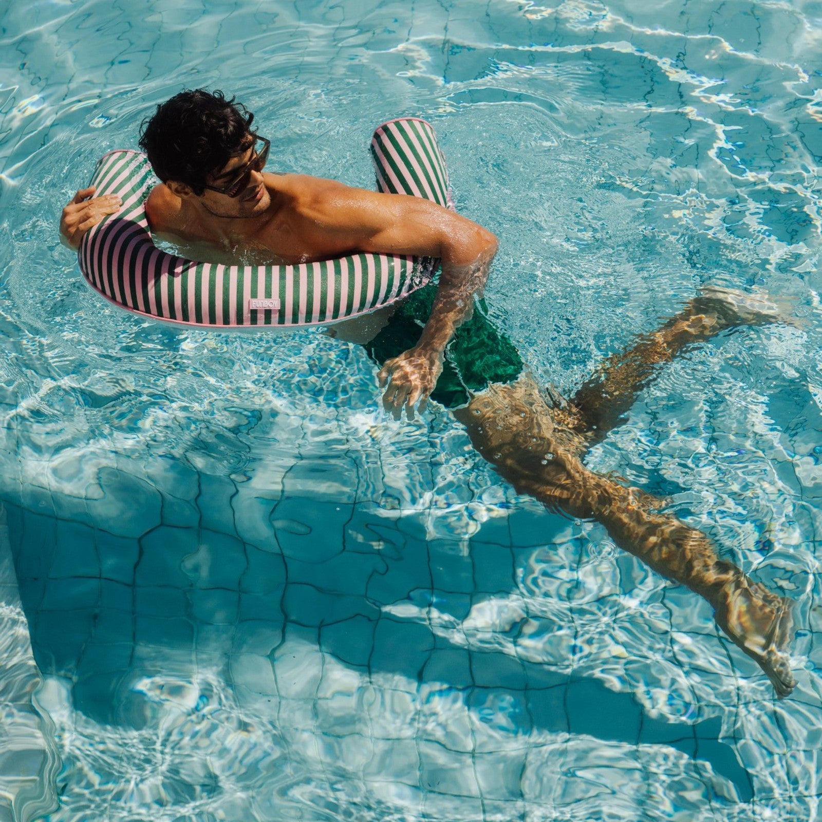 Striped  pink and green stripes on a fabric noodle float