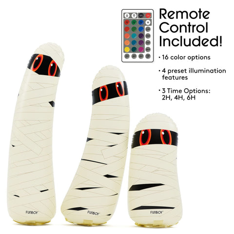 Three beige mummy-themed inflatable pen stimulators of different sizes with black bandages and red eye details, shown on a white background with a remote control graphic and text stating 'Remote Control Included!'.