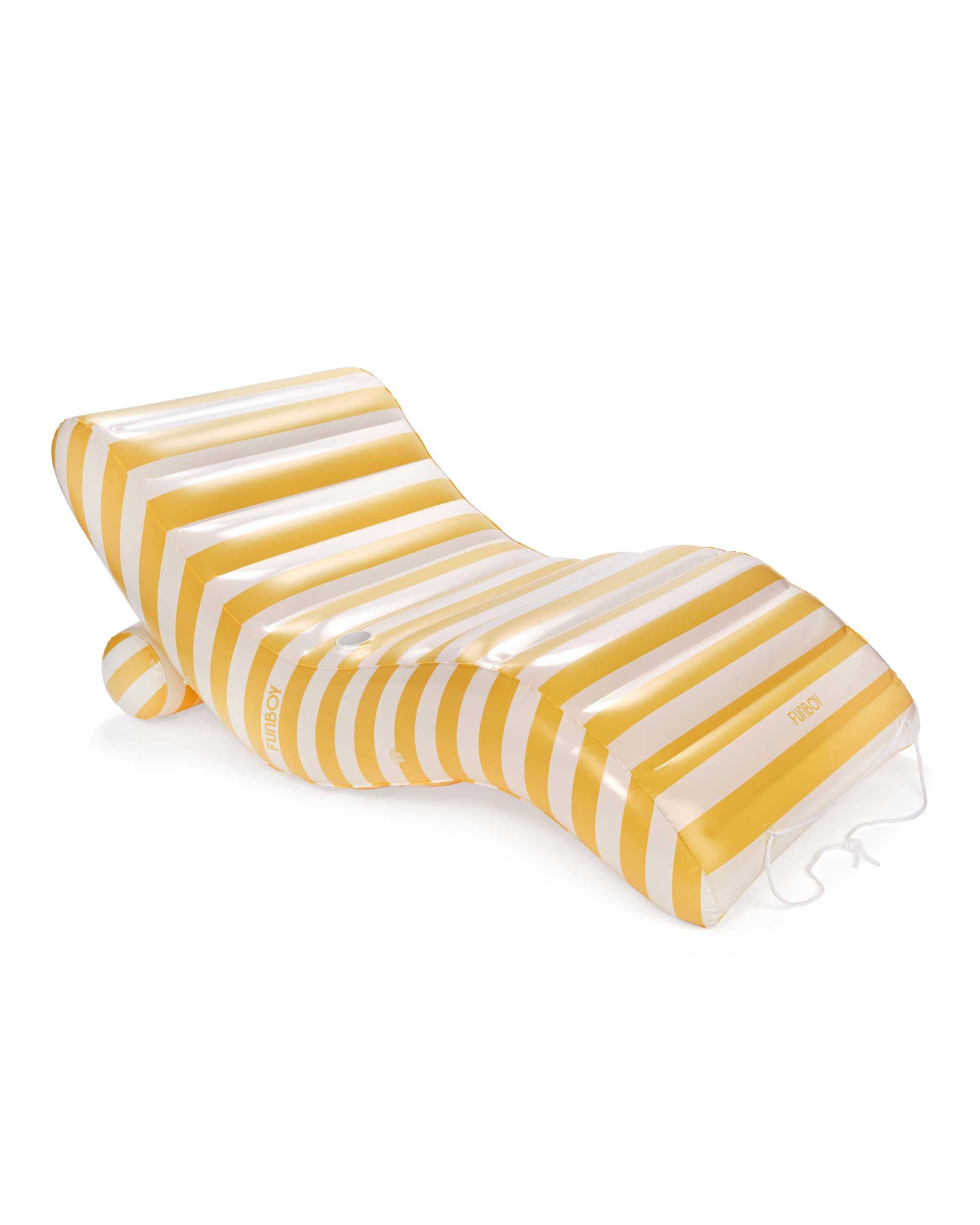 Yellow and white striped pool float on a white background