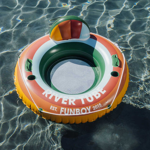 Inflatable river tube with colorful design and 'Funboy' branding on water.