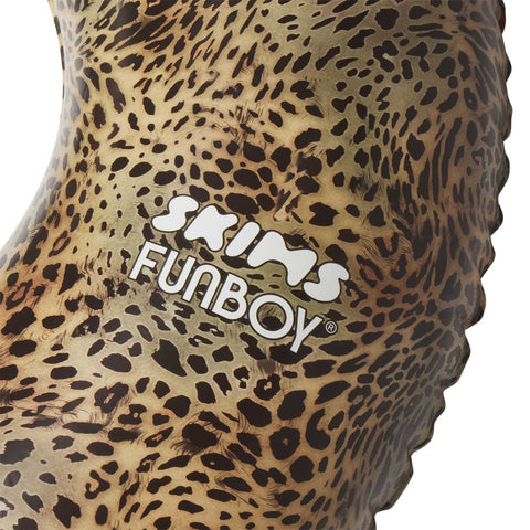 Three women lounging on inflatable tubes in a pool, SKIMS x FUNBOY Luxe Cheetah Tube Float