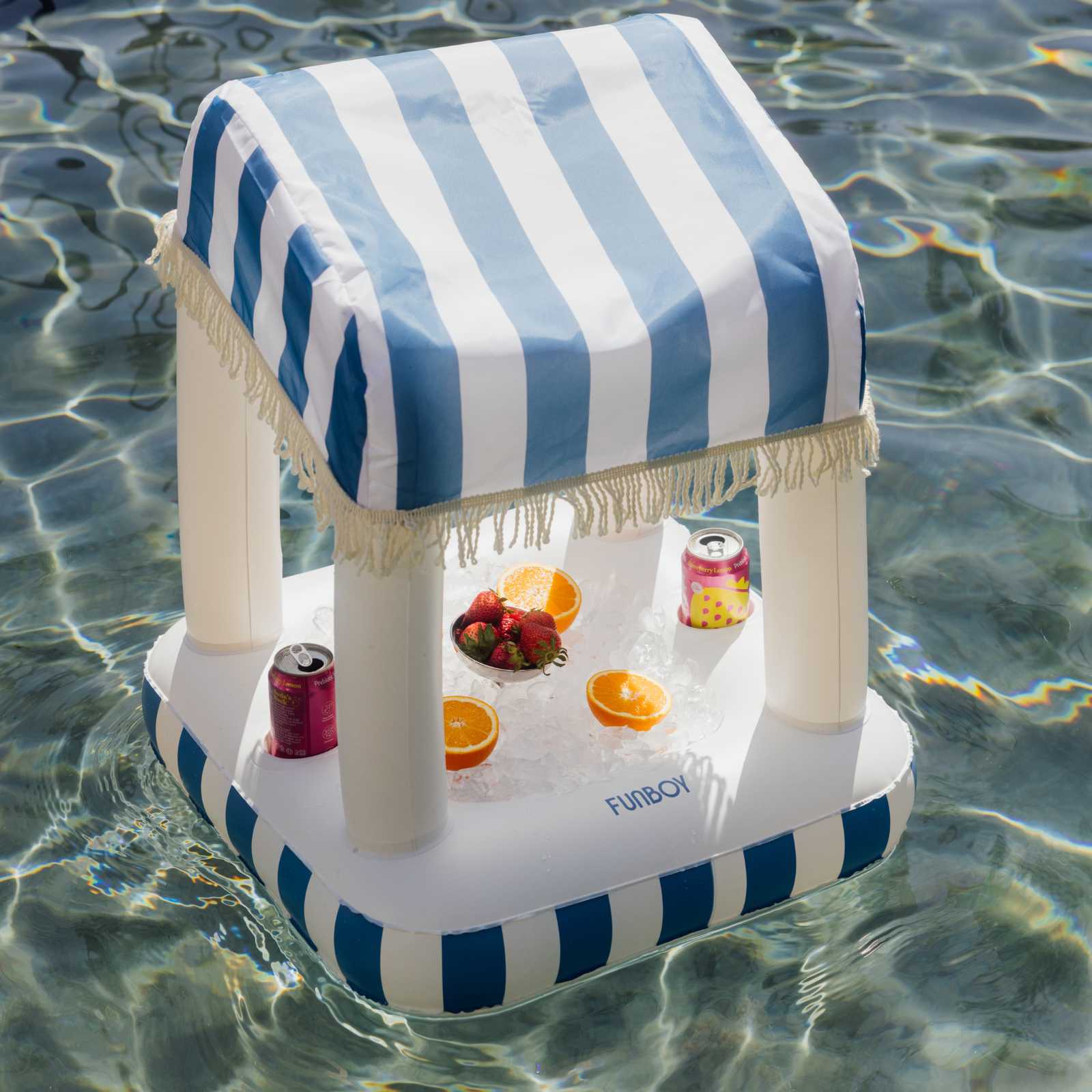 Inflatable pool bar with striped canopy and refreshments in water