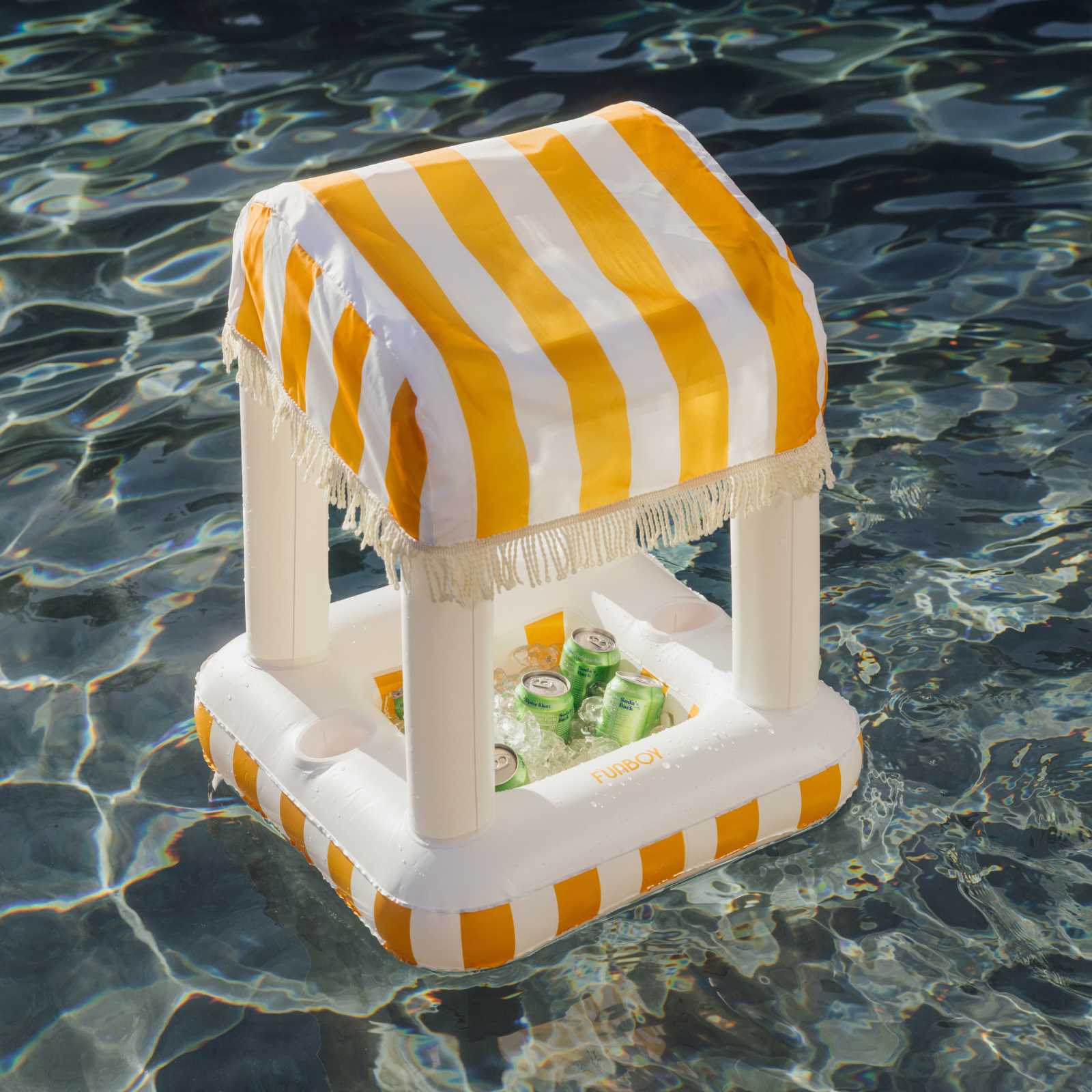 Inflatable cooler with striped canopy floating on water