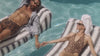 FUNBOY video featuring the navy stripe fabric lounger pool float. Luxury pool floats. 